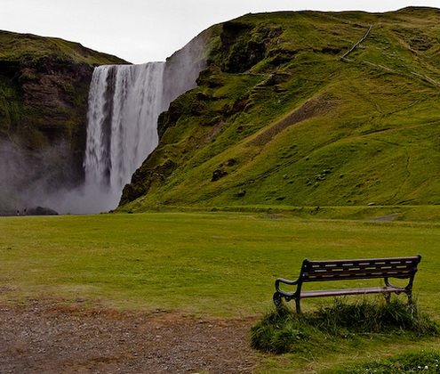 Iceland waterfall and a bench